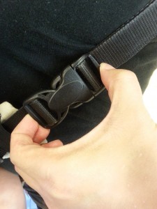 Use fingers to pull adjuster upwards to extend strap length